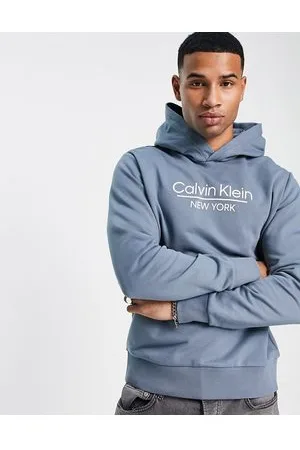 Calvin Klein Embossed Logo Comfort Hoodie in Blue for Men