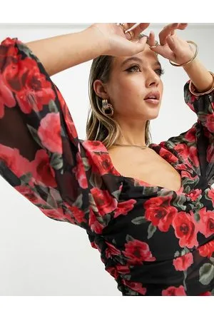 In The Style Sweetheart neckline volume sleeve body in black floral