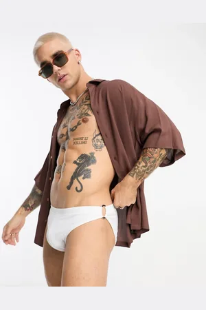 ASOS Swim trunks with gold hardware in