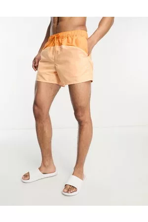 ASOS Swim shorts in short length with cut and sew in