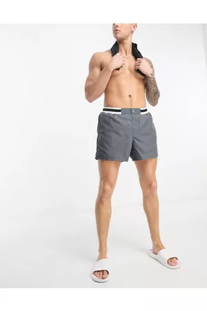 ASOS Swim shorts in mid length with smart styling in charcoal