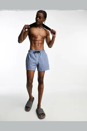COLLUSION Shorter length swim short in