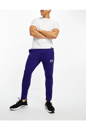 Under Armour sportstyle pique track pants in black | ASOS