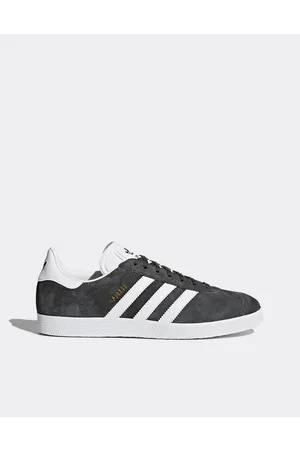 adidas Gazelle trainers in dark
