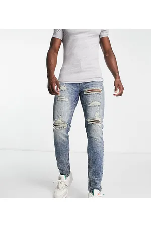 DTT rigid tapered fit ripped jeans in mid blue