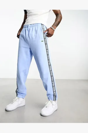 Lacoste Heritage tapped logo joggers in light