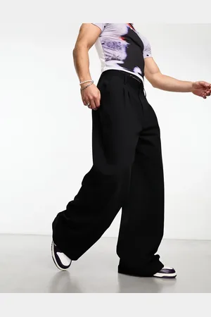 COLLUSION 90s fit baggy pants in black vinyl