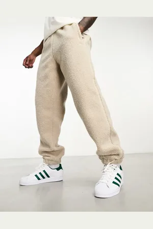 adidas Premium Essentials teddy fleece joggers in beige