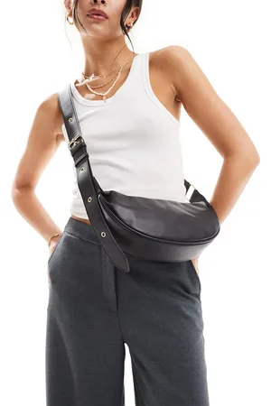 ASOS DESIGN cross body fanny pack with contrast puller in black