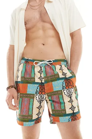 ASOS Swim shorts in mid length in bright patchwork print
