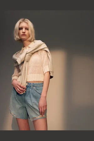 Topshop Denim pleated shorts in bleach