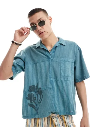 Reclaimed Cropped boxy polo shirt in patchwork texture with floral print