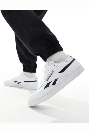 Reebok Club C Revenge trainers in and navy