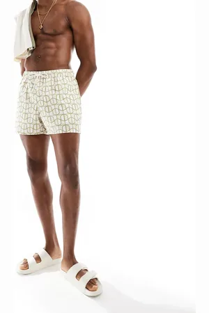 ASOS Swim shorts in short length in geo