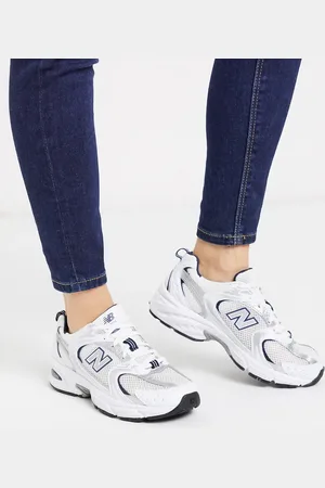 New Balance 530 sneakers in silver and blue