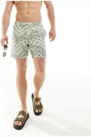 ASOS Swim shorts in short length in geo print