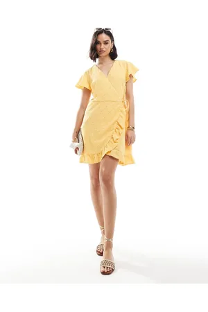 VILA Jersey broderie wrap mini dress in yellow