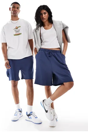 ASOS Unisex oversized shorts with cargo pockets in washed denim