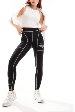 The Couture Club Oversized graphic leggings with contrast stitch in black