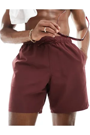 ASOS Swim shorts in mid length in burgundy