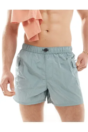 ASOS Swim short in short length with cargo pocket in