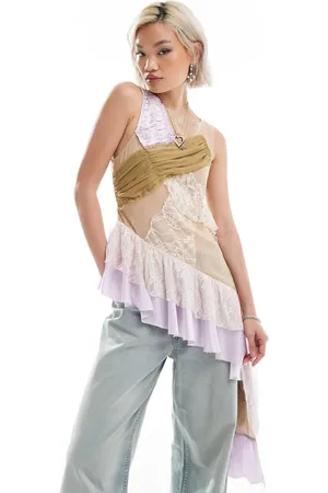 Reclaimed Limited edition longline asymmetric hem top in spliced fabric