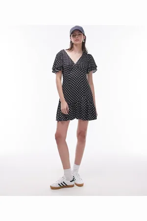 Topshop Bella mini tea dress with flutter sleeve in black and white spot print
