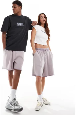 ASOS Unisex oversized shorts in washed lilac