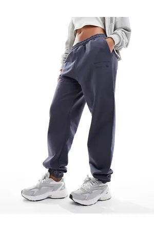 The Couture Club Graphic relaxed jogger in petrol blue