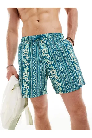 ASOS Swim shorts in mid length in tropical stripe print