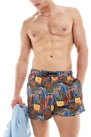 ASOS Swim shorts in short length in black print