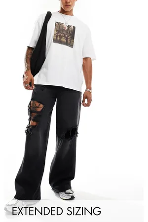 ASOS Super baggy jeans in washed with heavy rips