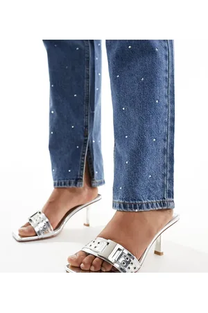 Simmi London Simmi London Wide Fit Bexley mid heeled mules with eyelet buckle detail in