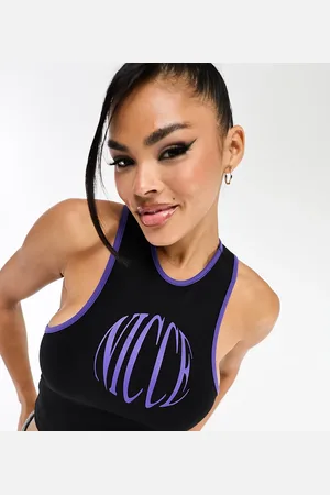 Nicce London Able cropped vest top in with chest logo print