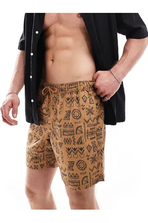 ASOS Swim shorts in mid length in geo