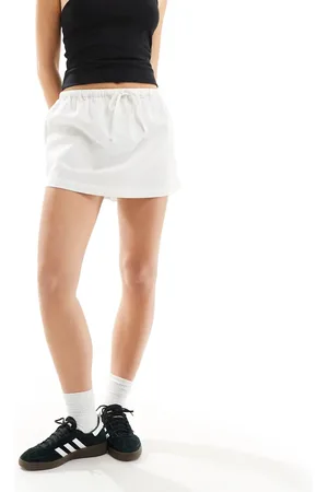 COLLUSION Beach low rise woven mini skirt in ecru