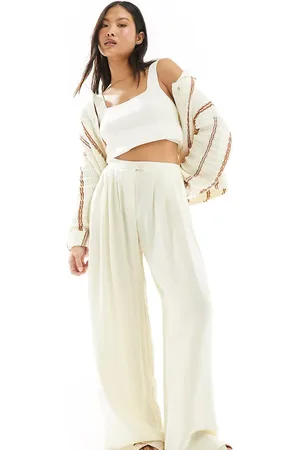 Stradivarius Petite fluid pleat front trouser in buttermilk