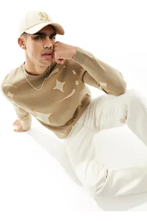 ASOS Relaxed knitted jumper with beige celestial print