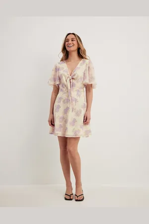 NA-KD Tie front chiffon mini dress with floral print in beige