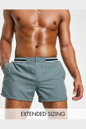 ASOS Swim shorts in short length with smart styling and contrast rib in
