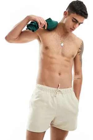 ASOS Swim shorts in short length in stone