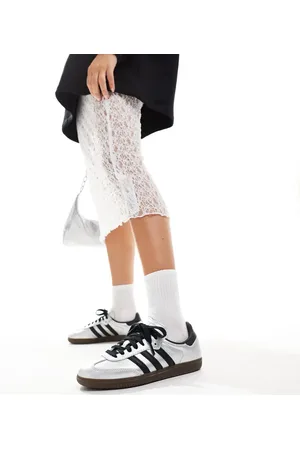 adidas Samba trainers in metallic and black