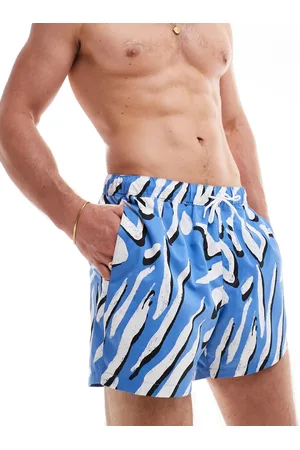 ASOS Swim shorts in short length in animal print