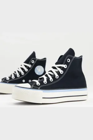 Converse Chuck Taylor Lift Hi trainers in with a blue detail