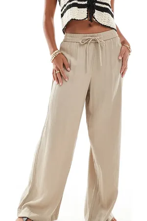 VILA Weighted plisse satin feel wide leg trousers in beige