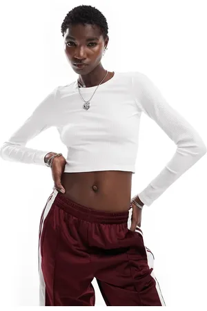 Monki Long sleeve ribbed shrunken top in