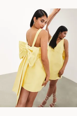 ASOS Structured mini dress with statement bow back detail in yellow