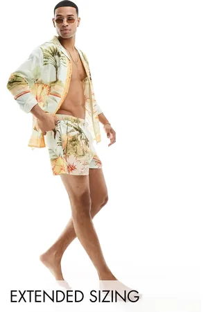 ASOS Co-ord swim shorts in short length in tropical print