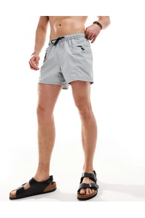 ASOS Swim shorts in short length with zip pocket and black drawcord in