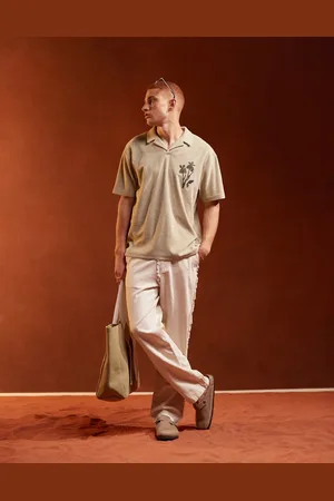 ASOS Relaxed towelling polo with floral embroidery